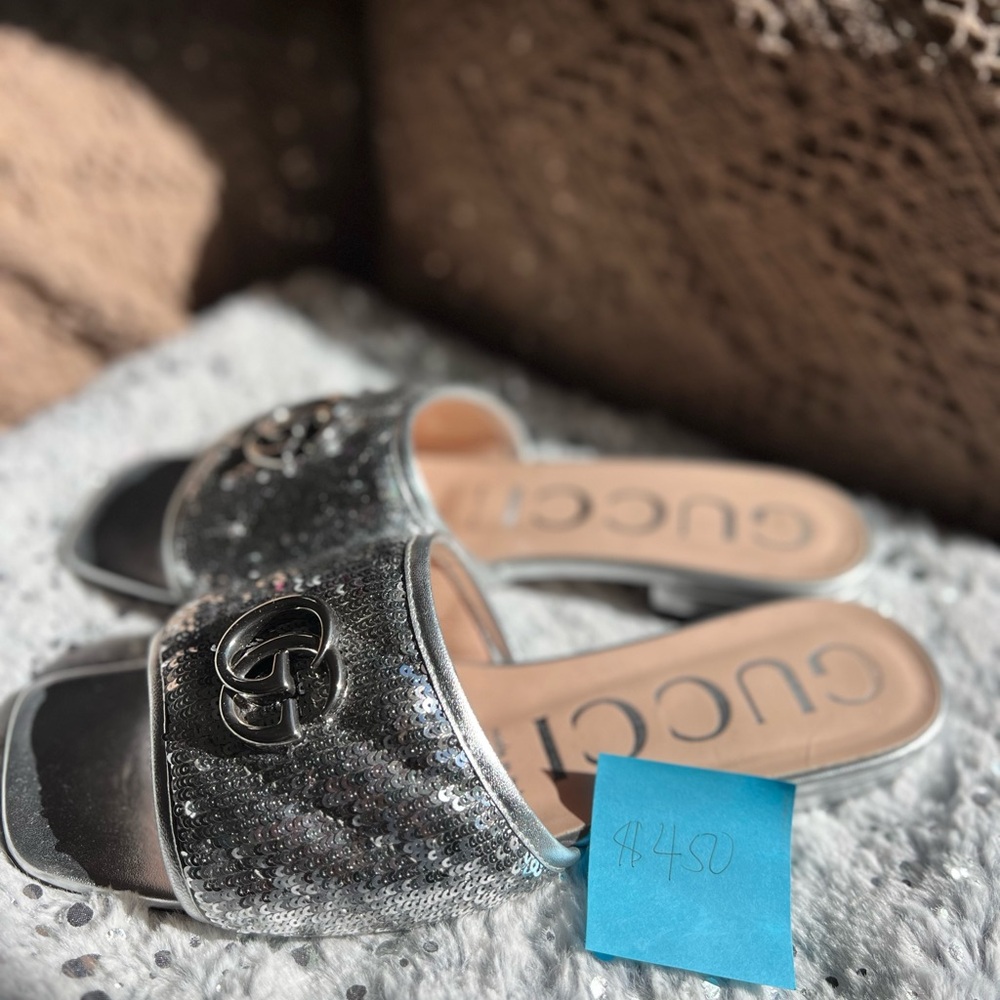 💯% Authentic. Silver sequined Gucci slip on. Used once. Practically brand new.